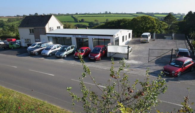 Investment Premises comprising a Car Showroom which is vacant, plus range of Garage and Workshops plus 2 One Bedroom Flats