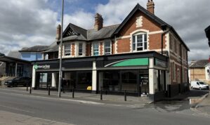Prominent Town Centre Retail / Showroom premises with Offices and Garage / Parking