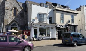Town Centre Investment premises comprising ground floor Retail Unit plus self large contained 2 bedroom flat over