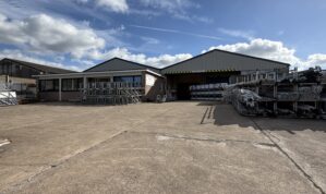 Prominent Industrial / Warehouse Unit with Offices and a large Yard / Parking area to the front on the main spine road through the estate